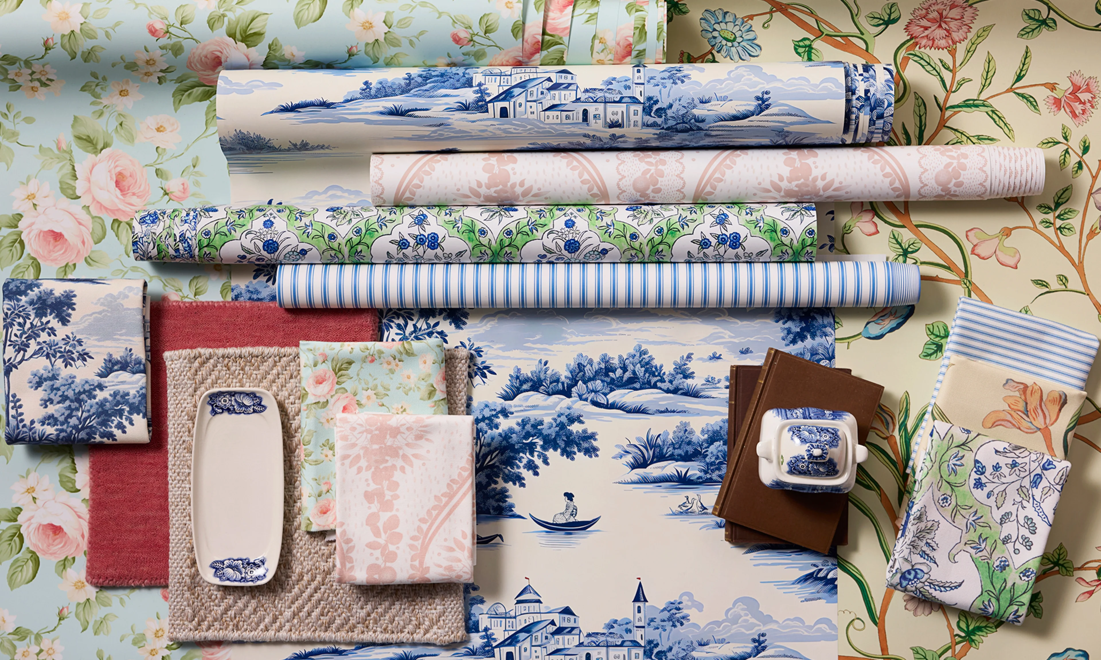 Rolls of english country wallpaper styled together.