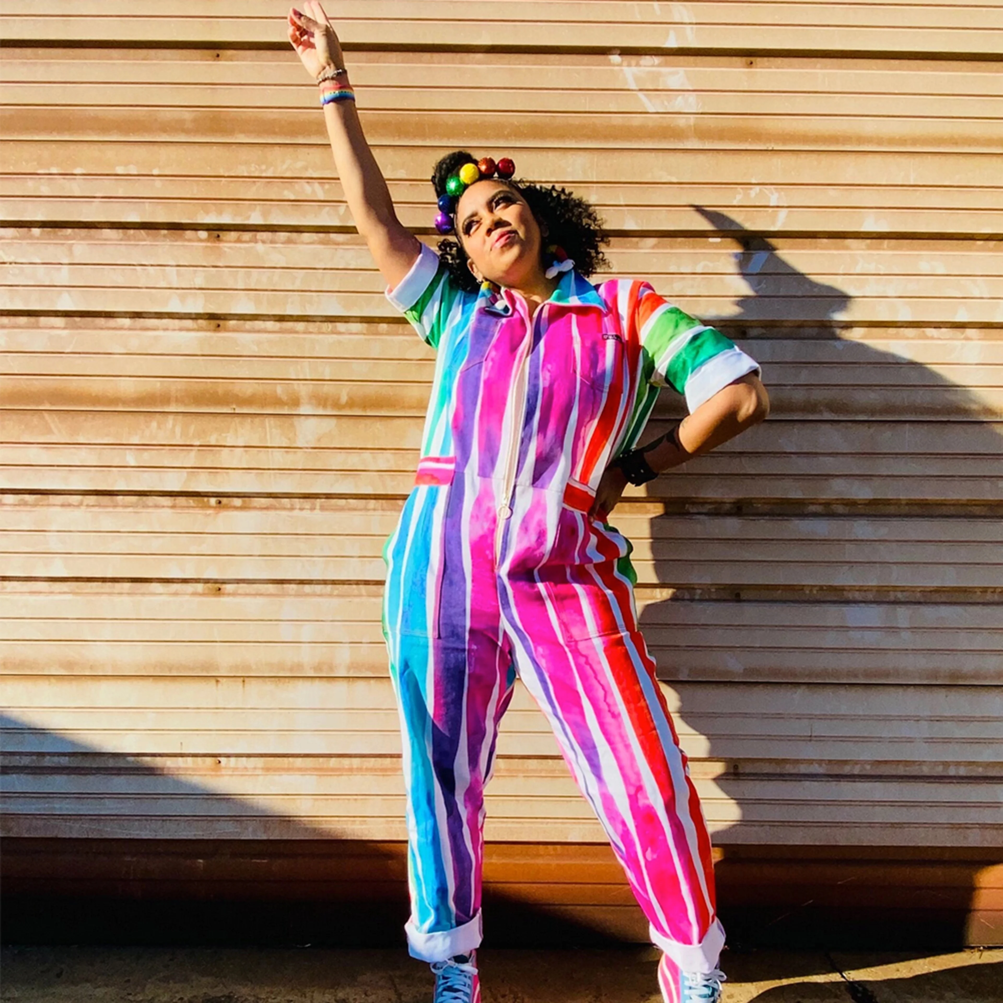 Woman wearing rainbow jumpsuit